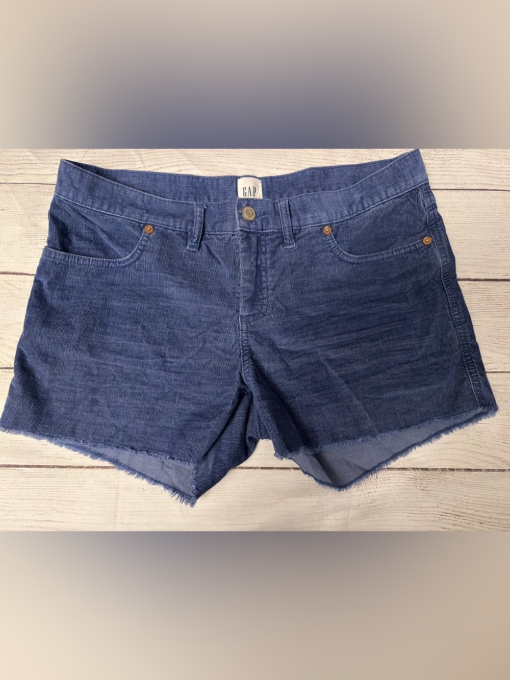 GAP Women's sz. 10 Indigo Fine Line corduroy Raw Hem shorts.